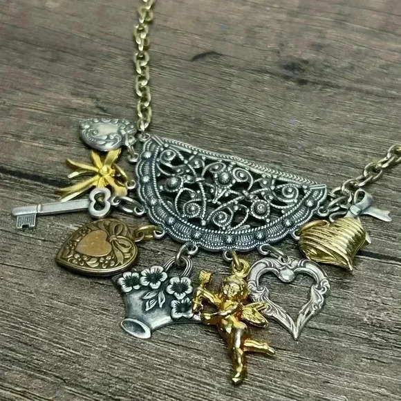 Vintage Bows, Hearts, Flowers, and Cupid Charms Multi Tone Metal Necklace - Picture 2 of 3